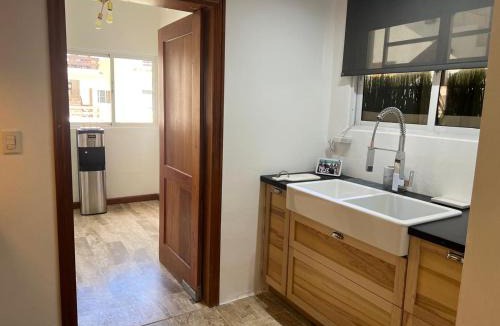 Playa Bibijagua House | Suite in shared apartment, pool and beach access