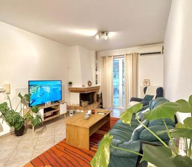 Saronida Apartment | Sunny Modern Beach Retreat Steps from the Shore