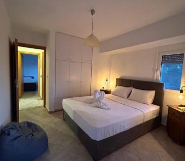 Saronida Apartment | Sunny Modern Beach Retreat Steps from the Shore