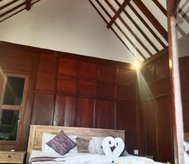 Lodtunduh Apartment | sunrise wood house