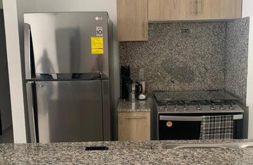 La Romana Apartment | Terrazas del Este, cuarto piso, terraza privada.
