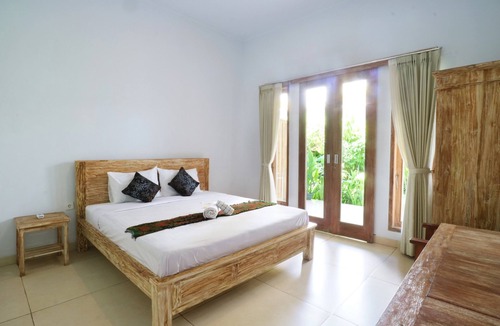 Batu Bolong Hotel | The Wina Guesthouse 2
