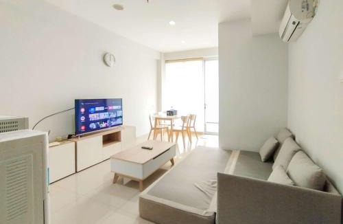 Dago Apartment | Tranquil Designed 2BR Apartment Dago Suites By Travelio