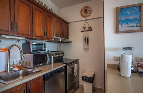 Juan Dolio Apartment | Trendy Beach Scene at a Harmony Beachfront Condo in Costa del Sol