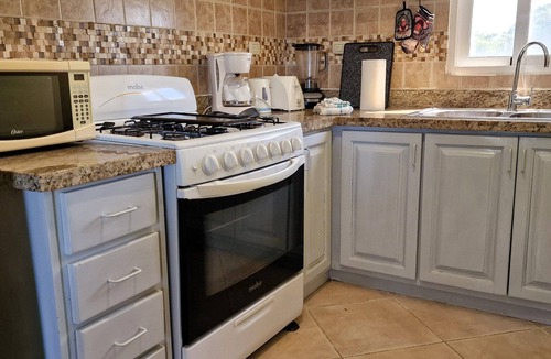 El Batey Apartment | Very private apartment in downtown Sosua. Large pool. Free weekly maid service.