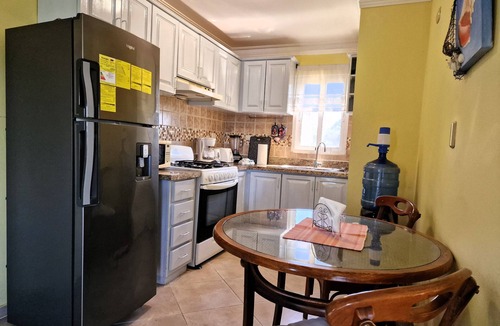 El Batey Apartment | Very private apartment in downtown Sosua. Large pool. Free weekly maid service.