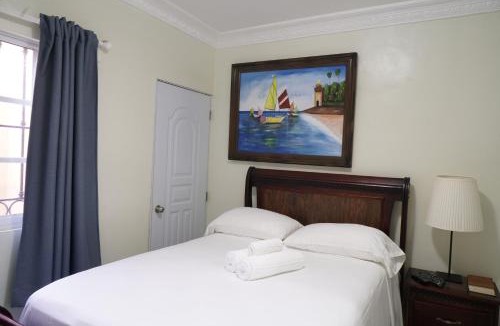 Reparto Ibarra Apartment | Villa Gumio 2BR Apt- 7 min walk to Boca Chica Beach apts