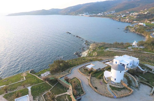 Tinos Town House | Windmill and houses by the sea // Stavros Bay
