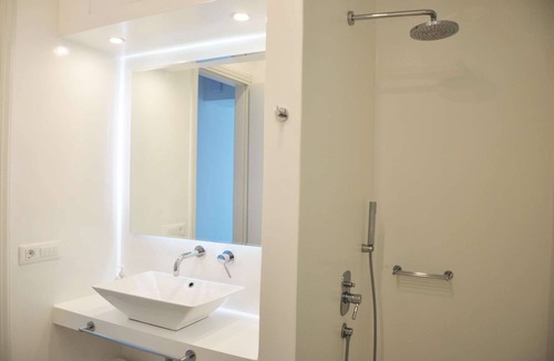 Tinos Town House | Windmill and houses by the sea // Stavros Bay