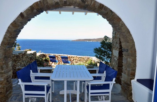 Tinos Town House | Windmill and houses by the sea // Stavros Bay