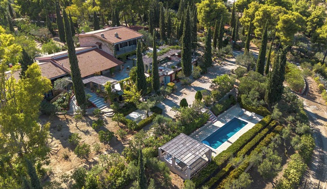 A private retreat villa with a pool and expansive outdoor space.