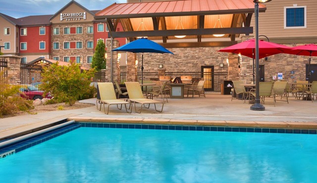 Access to a Heated Pool & Hot Tub! Free Breakfast Buffet. 1 Bedroom Suite. in Midvale