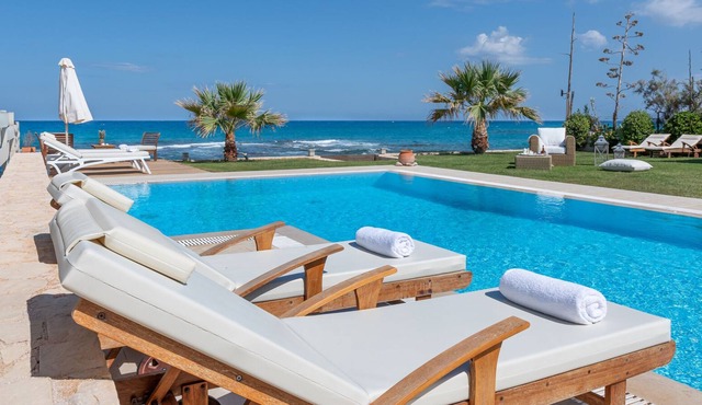Beachfront 5 bedroom villa with a heated pool
