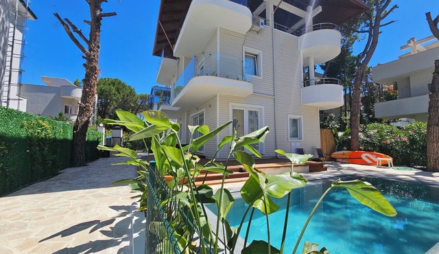 Beachfront `Blue Wave SPA Villa` in a Private Villa Resort