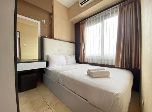 Comfy & Well Appointed 2BR at Tamansari Panoramic Apartment By Travelio