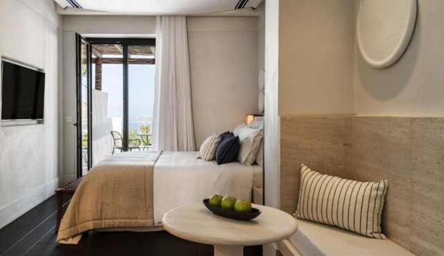 Escape to a Laid-Back Suite with Private Pool and Sweeping Aegean Views