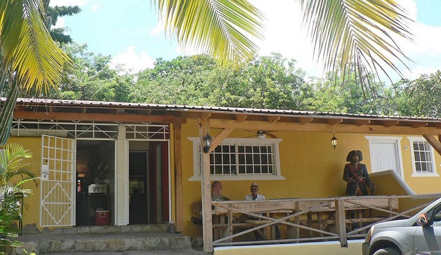Guest-friendly hotel room in lush tropical settings, with on-site restaurant
