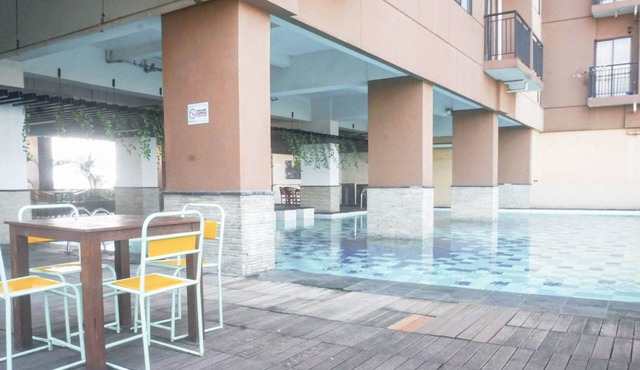 Homey & Restful Studio At Tamansari Panoramic Apartment