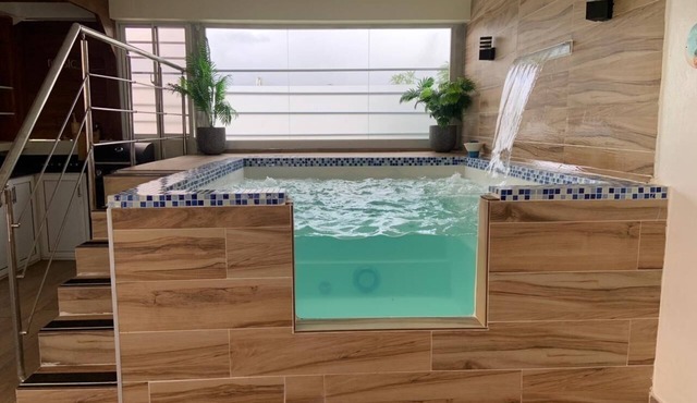 Lianas Rooftop apartment + Private Jacuzzi Just 8 min Near the Beach
