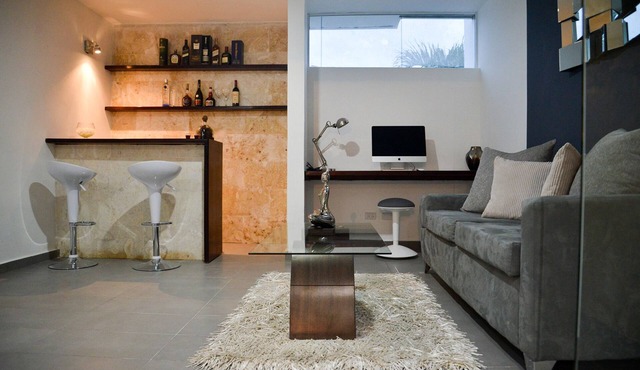 Luxury guest-friendly room in central Sosua, private bar, adults only