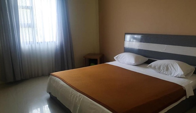 OYO 91266 Markoni 18 Guest House