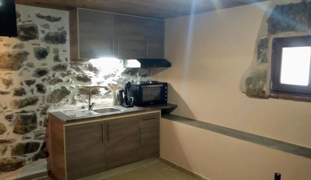 Panos Stone Tower: One-Bedroom House