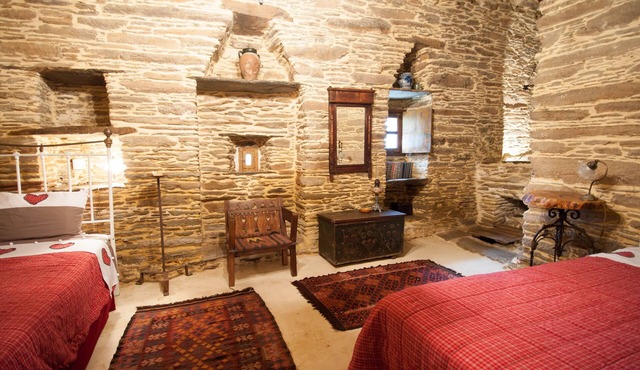 Renovated medieval cottage 200 sqm at Andros, accommodates up to 8 guests.