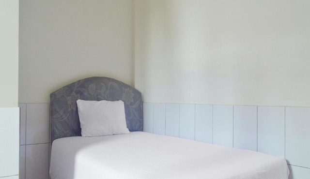 SPOT ON 91623 Pj Guest House Syariah