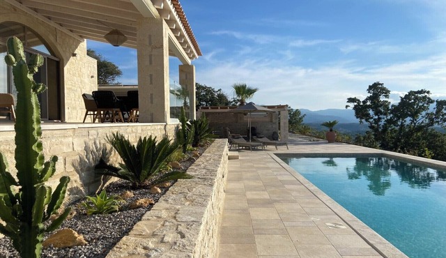 Villa Chalarosi, natural stone villa with panoramic views and heated pool