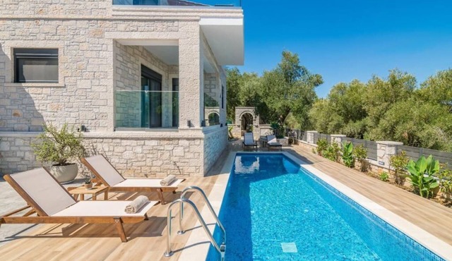 Villa Olive Green is new modern stone house