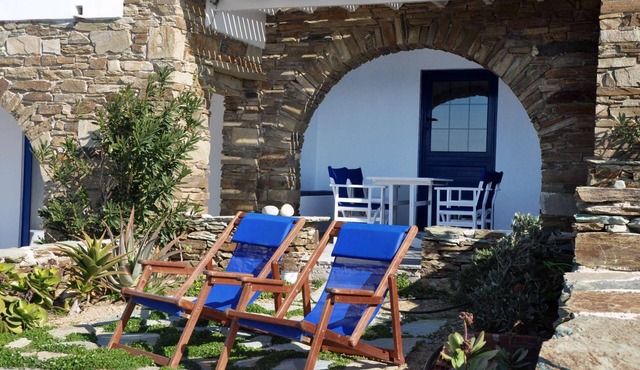 Windmill and houses by the sea // Stavros Bay