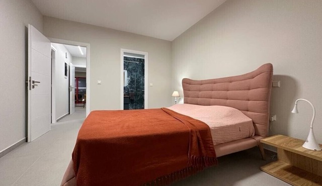 Your Perfect Seaside Escape in Saronida, just a 3‑minute walk from the beach.