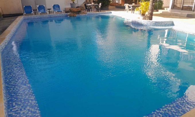 El Batey Apartment | 1-bedroom apartment with air conditioning, kitchen, swimming pool, city center