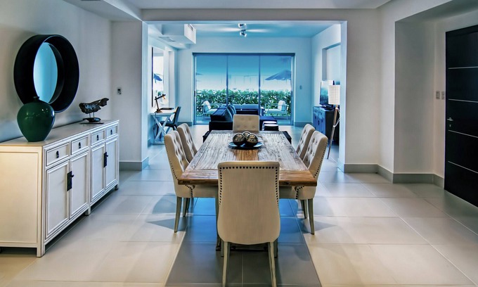 El Batey Apartment | 1BD beachfront condo in gated luxury residence, gym/pool, near everything
