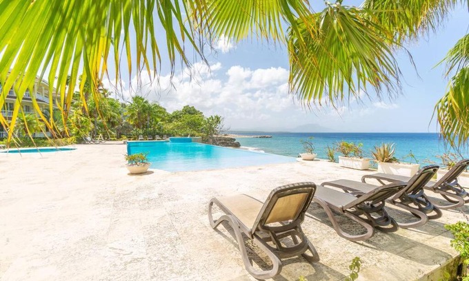 El Batey Apartment | Lovely 2-Bedroom unit rental with pool