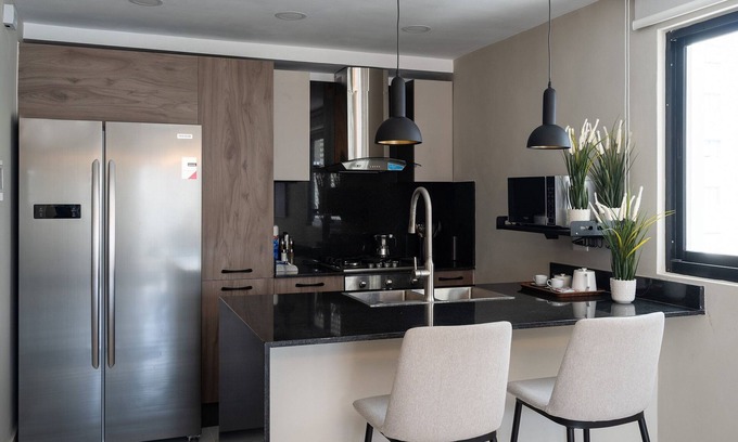 Serralles Condo | LuxuryCityCenterApart-Pool-Gym-WiFi-A/C-YellowKey*