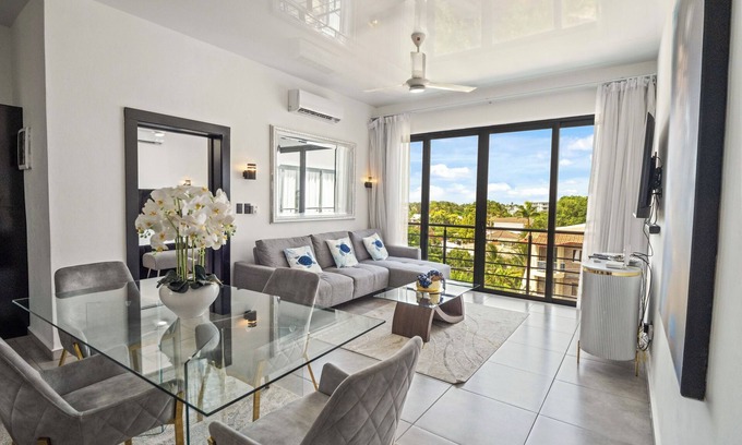 El Batey Apartment | Modern 2BR at Rizz Suites Pool Access Walk to Beach 2 King Beds Sosua