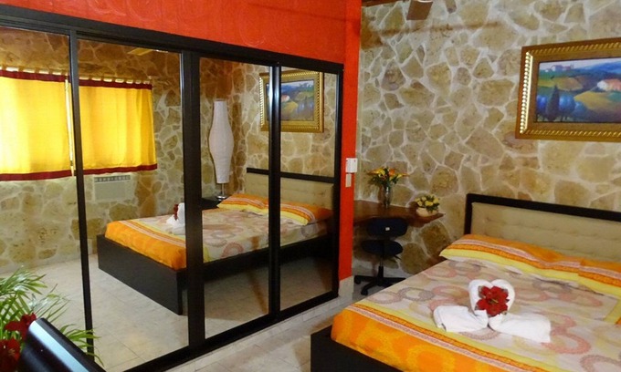 Playa Chiquita Apartment | Room + yummy breakfast, steps from casino/beach, guest-friendly, pool/TV/WiFi