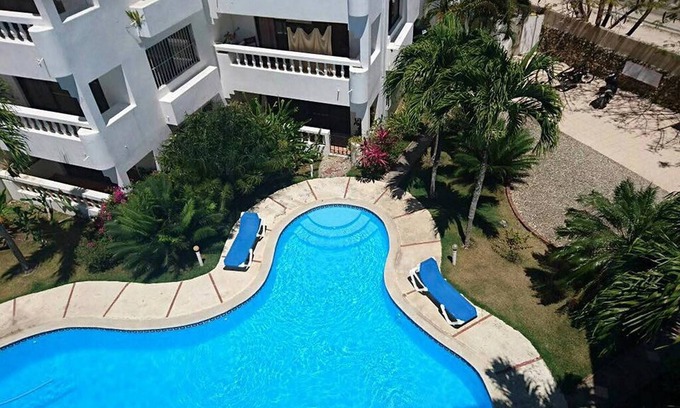 La Esplanada Apartment | Top-floor guest-friendly apartment in Sosua, pool/parking/Wi-Fi/Cable TV