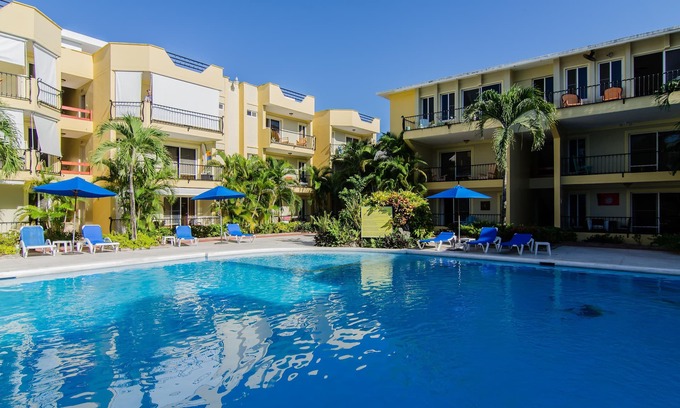 El Batey Apartment | Very private apartment in downtown Sosua. Large pool. Free weekly maid service.